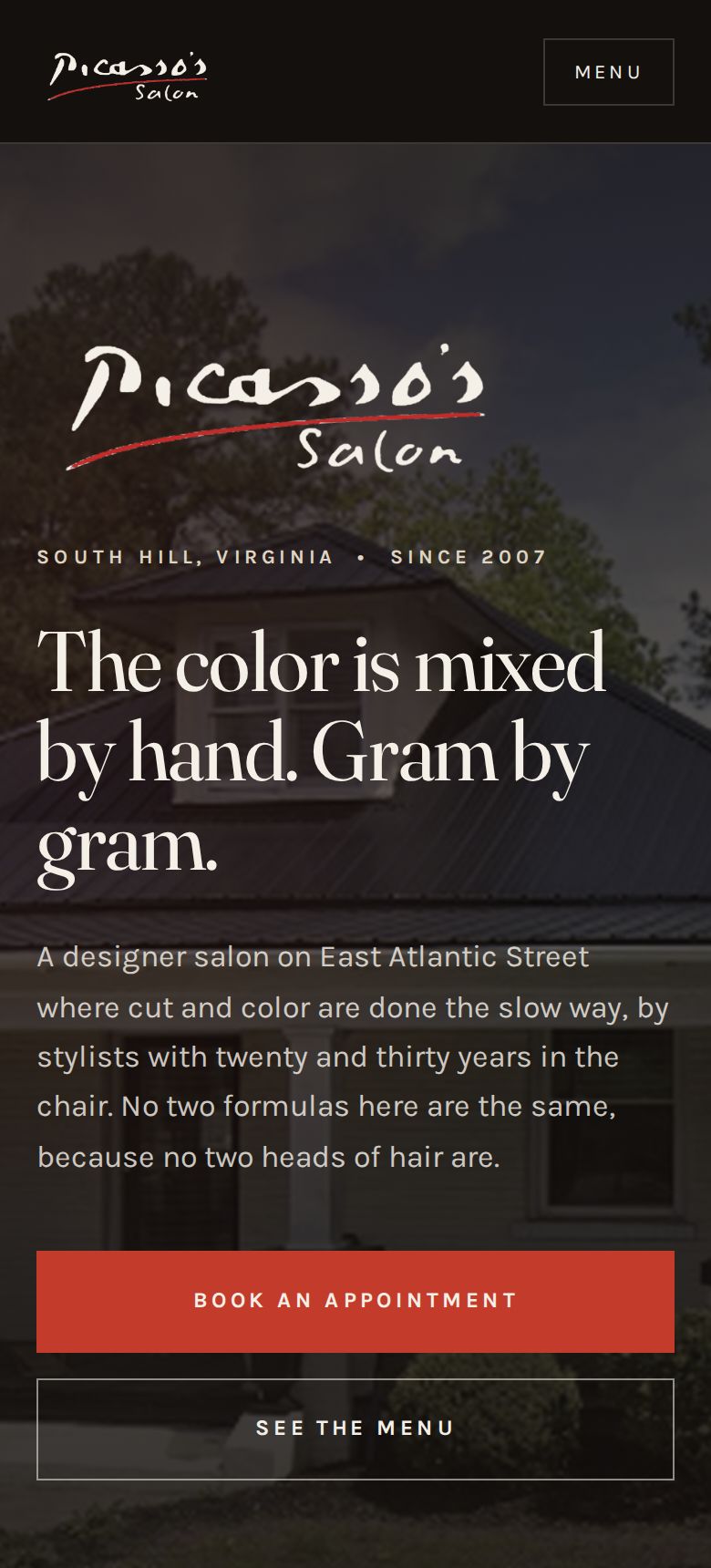 The same home page shown at laptop, tablet and phone widths